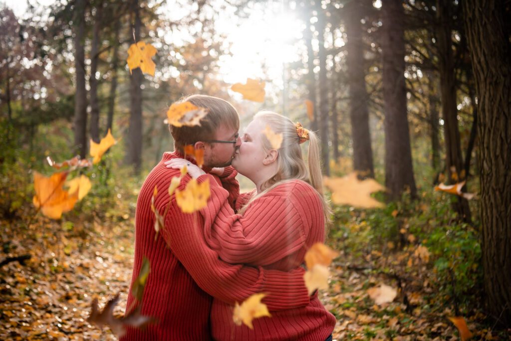 Nature-Engagement-Session-orange-sweaters-falling-leaves 3